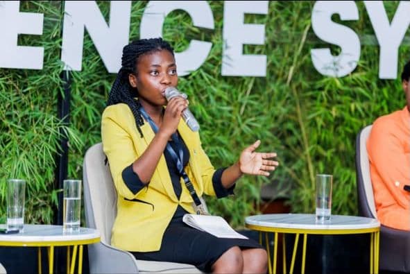 Joie Sophia UMUHOZA, Founder of Belong for Good, speaking at an event